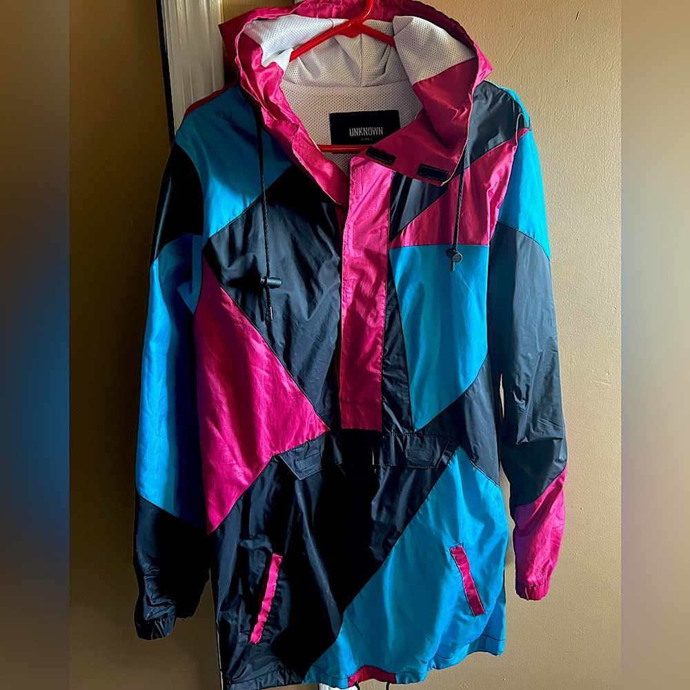 Wind Breaker Jacket - Multi Colored with extra pockets shown in picture.